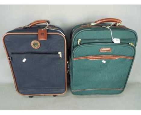 Two pieces of travel luggage including one by Carlton International. [2]
Location stock room LHS