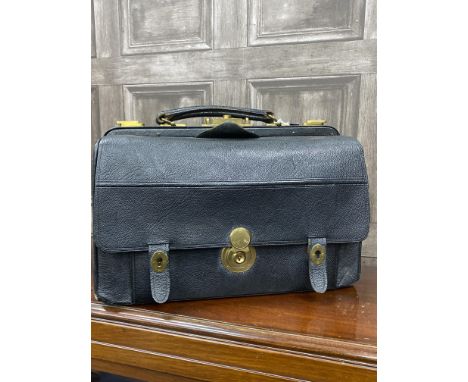 VINTAGE BLACK LEATHER GLADSTONE BAG, the interior lined in tan leather, the front drop front compartment fitted with glass bo