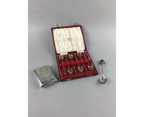 CASED SET OF SIX SILVER AND ENAMEL SPOONS, along with a silver cigarette case and a silver commemorative spoon