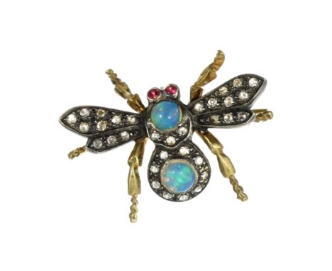 AN OPAL, RUBY AND DIAMOND BEE / INSECT BROOCH designed as a bee, its body jewelled with cabochon opals, its wings with diamon