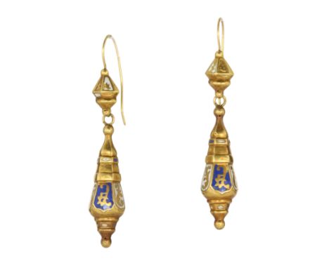 A PAIR OF ANTIQUE ENAMEL DROP EARRINGS the tapering stylised hexagonal bodies with blue and white enamel decoration, suspende