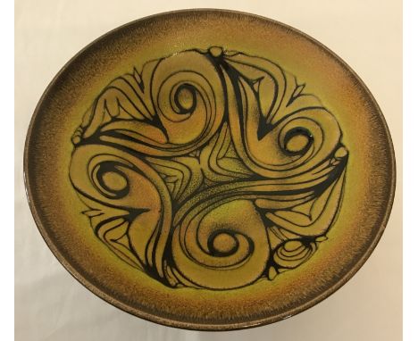 A vintage Aegean design large Poole pottery bowl in yellow, orange, brown and black colourway. Marked "Poole England Aegean 5