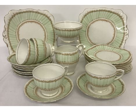 A vintage hand painted Art Deco style part tea set in mint &amp; tan colourway. Pattern 4138 by Bell China.  Comprising 4 cup