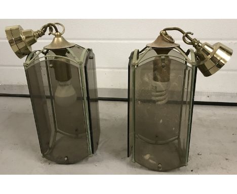 2 brass and smoked glass panel ceiling hanging lights.  Approx. 45cm tall including ceiling fixture.