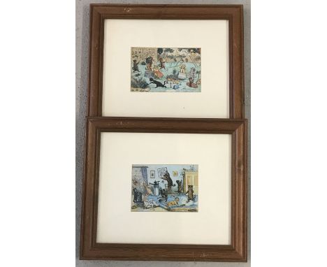 A pair of Louis Wain cat prints in modern wooden frames.  Approx. 31 x 36cm.