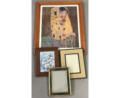 A small collection of frames and prints to include Klimt's "The Kiss". Together with a vintage blue &amp; white tile depictin