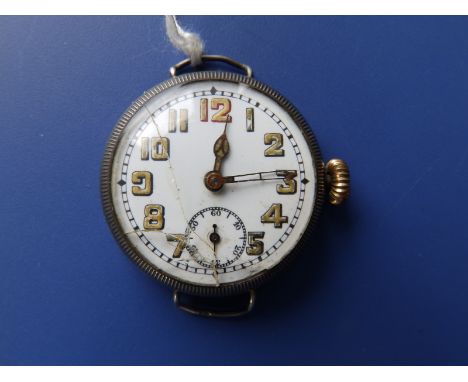 A WWI silver trench watch with white enamel dial, luminous hands and numerals, subsidiary seconds, Swiss movement, London imp