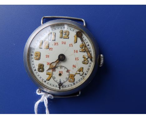 A WWI white metal trench watch with French Swan silver mark to case -  the 24 hour dial with cracks to enamel, rubbed paint a