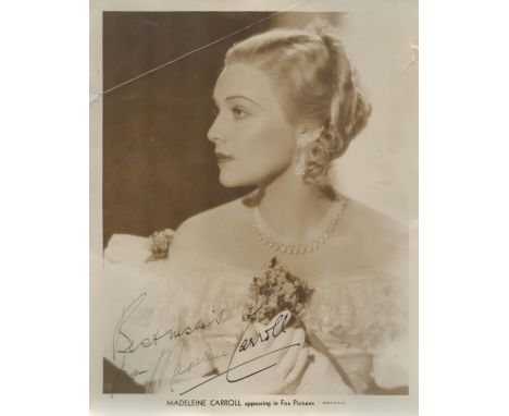 Madeleine Carroll signed vintage 10x8 photo. Slight crease. (26 February 1906 - 2 October 1987) was an English actress, popul