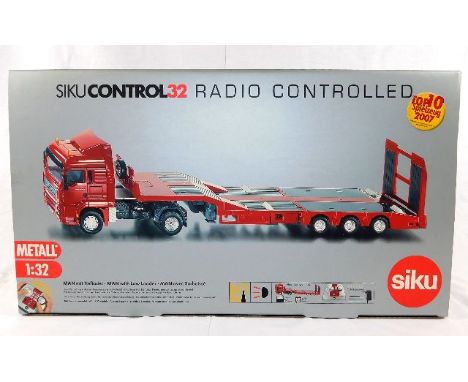 A boxed Siku 1:32 scale radio controlled diecast truck &amp; trailer 