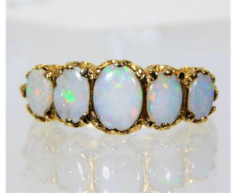 A 9ct gold ring set with opal 3.4g size K