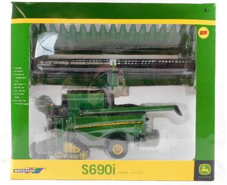 A boxed diecast model of a Britains 1:32 scale John Deere S690i Combine Harvester