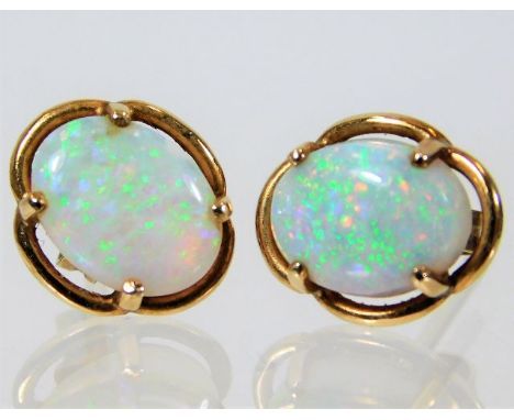 A pair of 10ct gold opal set earrings 1.7g