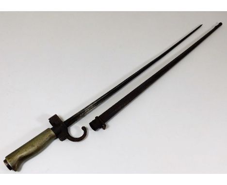 A 19thC. French quatrefoil bayonet with scabbard