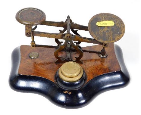 A lacquer &amp; walnut veneer set of postal scales