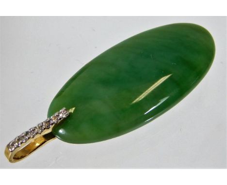 A jade pendant set with 9ct gold &amp; diamond 8.6g