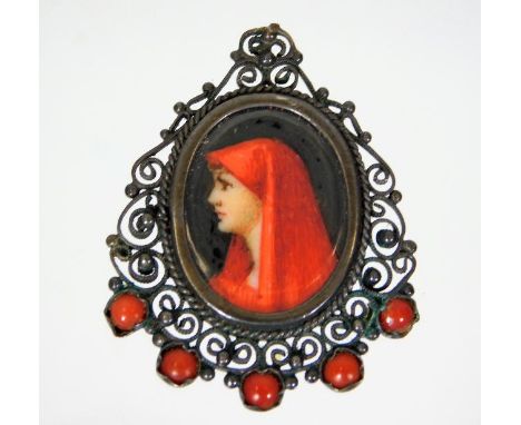 A white metal pendant set with coral &amp; hand painted miniature portrait
