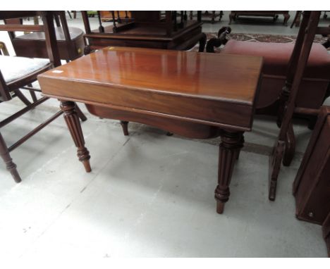 A 20th Century mahogany period style commode stool having inset panel and reeded legs, width approx. 67cm