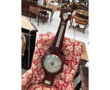 A late 19th Century mahogany cased banjo barometer having traditional silvered dial named James Braham, Torquay, with humidit