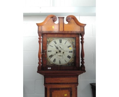 An early 19th golden oak and mahogany longcase clock having swan neck and spindle hood containing painted dial and eight day 