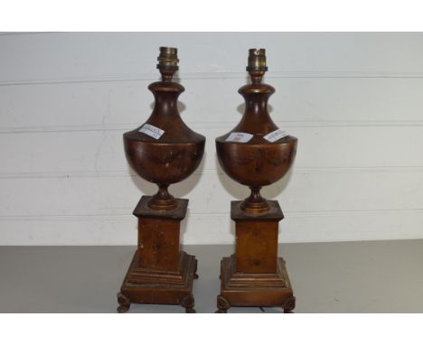 PAIR OF PAINTED METAL TABLE LAMP BASES FORMED AS VASES ON PEDESTALS