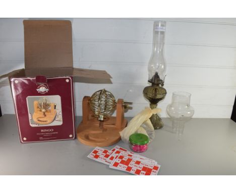 DEBENHAMS BINGO WHEEL TOGETHER WITH A GLASS BASED OIL LAMP