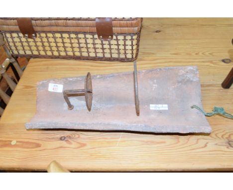 WALL MOUNTED CANDLE HOLDER FORMED FROM A TERRACOTTA ROOF TILE