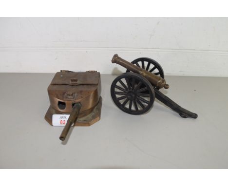 DESK STAND FORMED AS A MILITARY GUN, MARKS TO THE INTERIOR 'CAST FROM METAL EX-SURRENDERED GERMAN BATTLESHIP HELGOLAND', THOM