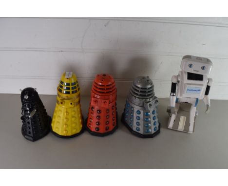 FOUR PLASTIC DALEK TOYS TOGETHER WITH A CONFUSED.COM ROBOT