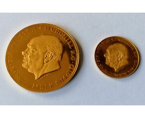 An 18ct gold Winston Churchill limited edition commemorative two-coin set with profile portrait and inscription 'This was the