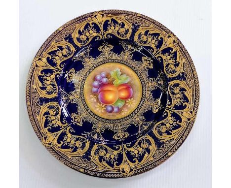 A Royal Worcester hand painted cabinet plate 'Fallen Fruits', peaches and grapes, signed Leaman, embellished in acid gold on 