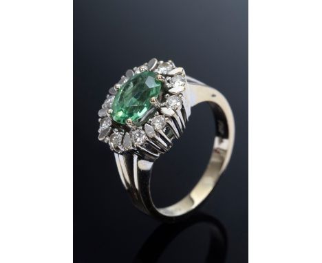 WG Ring mit oval facettiertem Turmalin in einer Brillantlunette (zus. ca. 0.36ct/VSI/W), 5,9g, Gr. 50