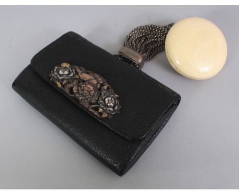 A GOOD QUALITY EARLY 20TH CENTURY SIGNED JAPANESE LEATHER SAGEMONO POUCH WITH IVORY MANJU NETSUKE, the manju plain, the pouch