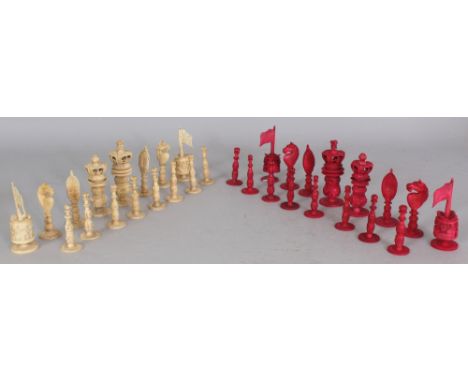 A 19TH CENTURY CHINESE CANTON SECTIONAL IVORY CHESS SET, together with a painted wood box, one side natural, the other staine