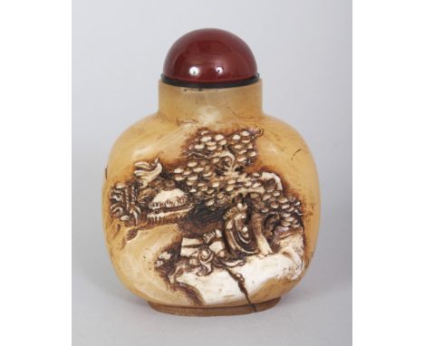A CHINESE JADE-LIKE HARDSTONE SNUFF BOTTLE & STOPPER, of larger than average size, the sides decorated in relief with sages i