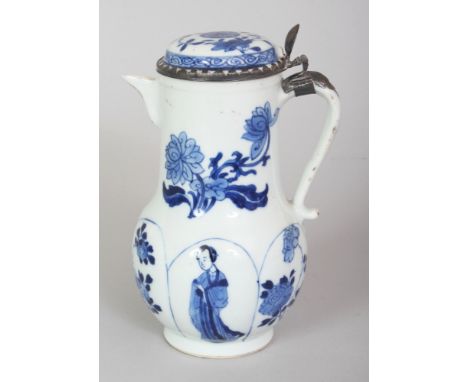 A GOOD 17TH/18TH CENTURY SILVER-METAL MOUNTED CHINESE KANGXI PERIOD BLUE & WHITE PORCELAIN JUG & COVER, the cover hinged, the