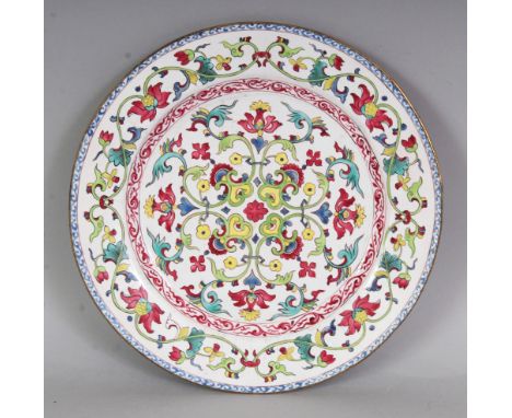 AN UNUSUAL 18TH/19TH CENTURY CHINESE CANTON ENAMEL DISH, decorated to its centre with a formal scrolling lotus and ruyi desig