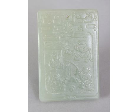 A CHINESE CELADON JADE PENDANT, of rectangular form, decorated to one side with calligraphy and to the reverse side with a fi