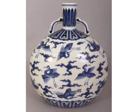 A CHINESE MING STYLE BLUE & WHITE PORCELAIN MOON FLASK, decorated between formal borders with cranes amidst cloud scrolls, th