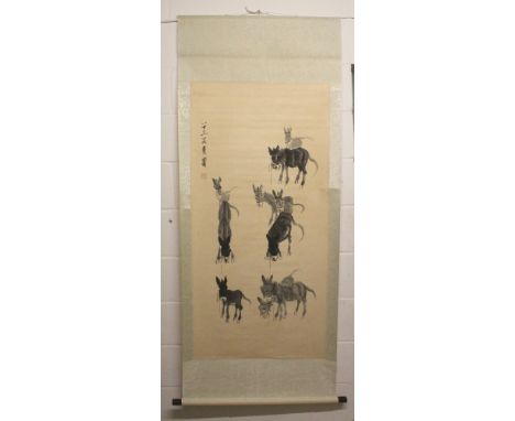 A CHINESE HANGING SCROLL PICTURE, decorated on paper with calligraphy, artist's seal and with a group of donkeys, the picture