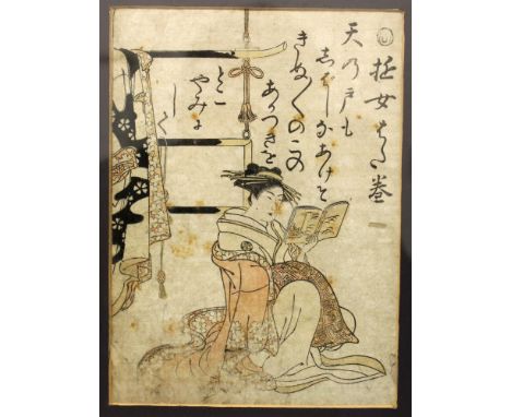 AN ORIGINAL 18TH CENTURY FRAMED WOODBLOCK PRINT BY MASANOBU, depicting a kneeling bijin reading poetry, possibly from the boo