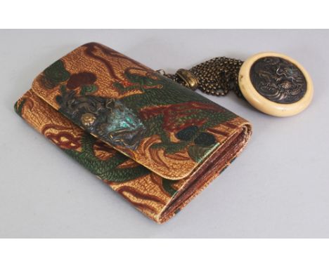 AN EARLY 20TH CENTURY JAPANESE LEATHER SAGEMONO POUCH WITH MANJU NETSUKE, the manju bowl fitted with an embossed metal dragon