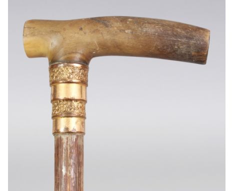 A RHINO HORN HANDLED BAMBOO MASONIC WALKING STICK, with a gilt-plated collar bearing impressed marks and a Masonic Eye of Pro