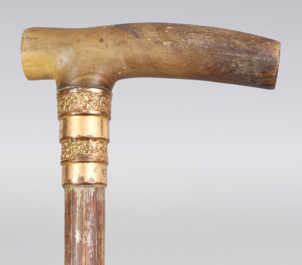 A Rhino Horn Handled Bamboo Masonic Walking Stick With A Gilt Plated