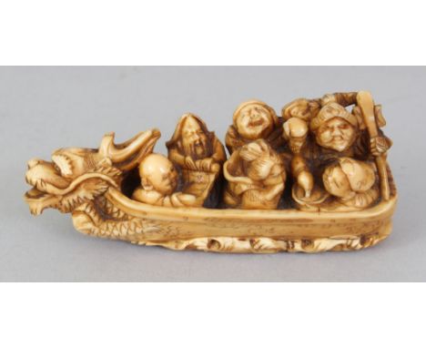 A GOOD QUALITY SIGNED JAPANESE MEIJI PERIOD IVORY NETSUKE, carved in the form of the Seven Lucky Gods in a dragon-prowed boat