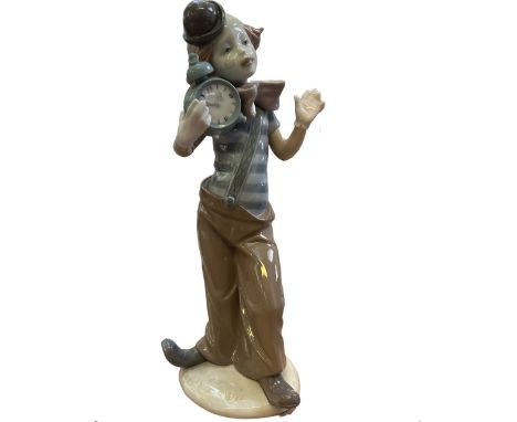Lladro figure of a clown with clock, model number 53056 Height 33 cm 