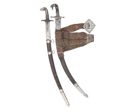 A South Indian Silver-Mounted ShamshirEarly 19th CenturyWith curved fullered blade of finely watered wootz steel double-edged