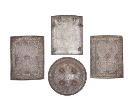 Three Indian Chahar Ayneh Plates, A Persian Dhal And Bazu Band, And A Pair Of Stirrups 18th/19th CenturyAll of steel, the fir