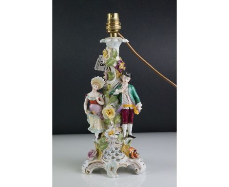 Dresden Porcelain Table Lamp in the form of a man and woman stood on a floral encrusted tree, 33cms high (a/f) 