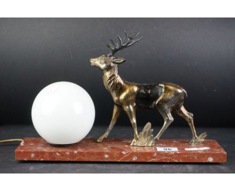 Art Deco style Lamp in the form of a Spelter Stag stood on a Red Marble Base, 38cms long